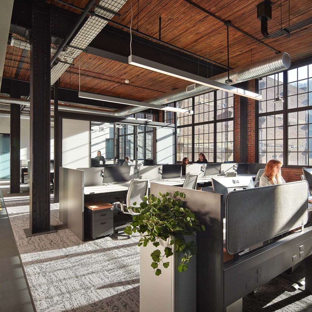 Autonomous Vehicle Company 01 Open office space with work stations.